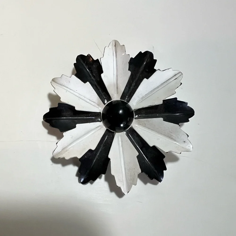 Vintage floral brooch black&white enamel petals and solid black center.